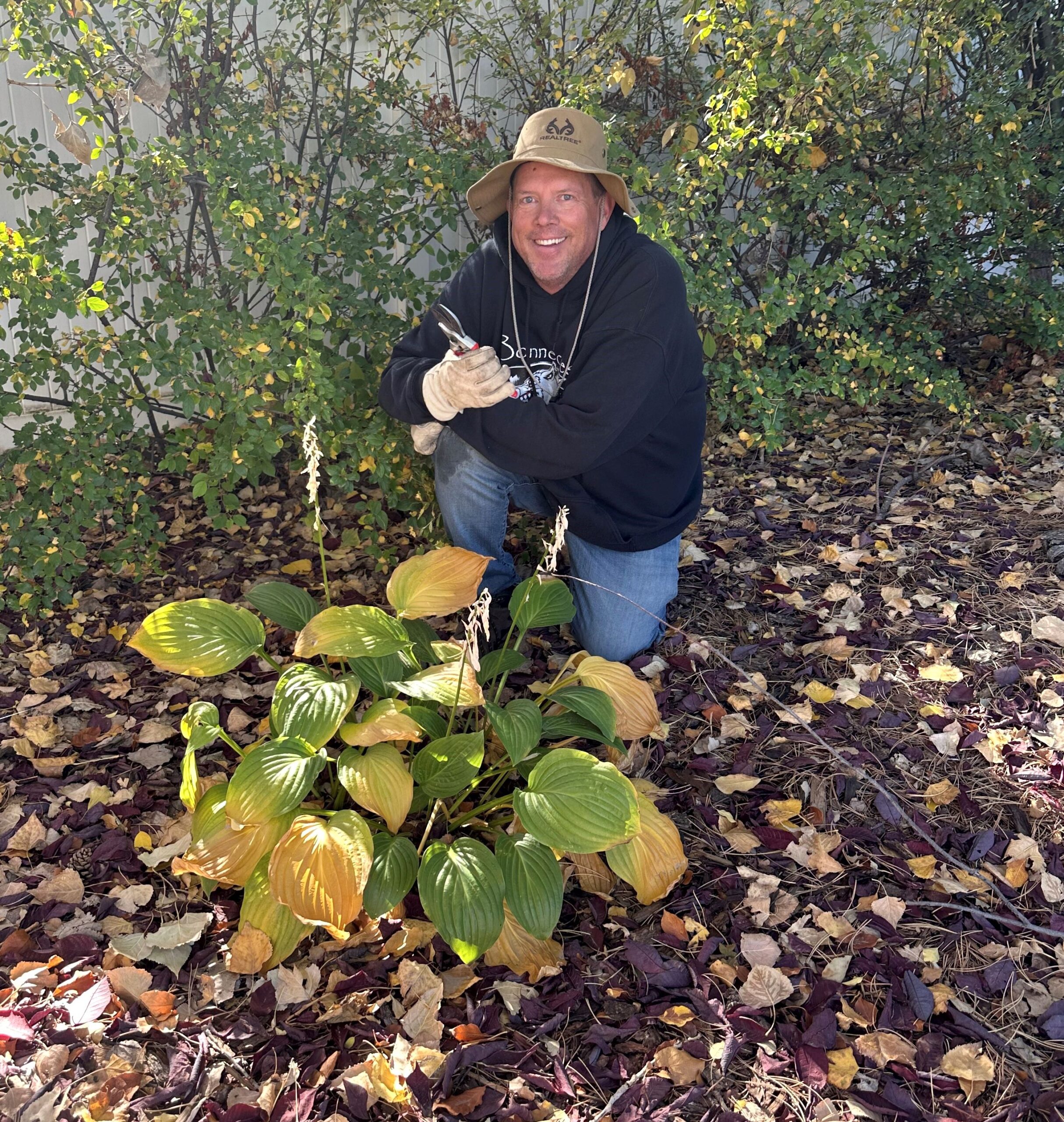 Rex Anderson (owner) Prunes Fall Perennials